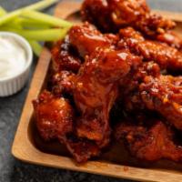 Hot Wings · Buffalo style wings made with seasoned peppers. Served with ranch or bleu cheese.