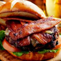 Bacon Cheeseburger a la Carte · Crispy bacon pieces topped on 1/3 lb. of beef patty, slices of red tomatoes, red onions, let...