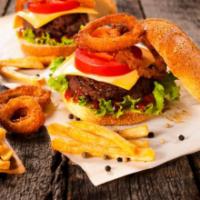 Onion Ring Cheeseburger a la Carte · Melted american cheese with onion rings topped with 1/3 lb. beef patty, lettuce, red onion s...