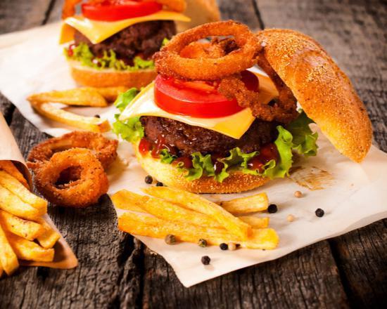 Onion Ring Cheeseburger a la Carte · Melted american cheese with onion rings topped with 1/3 lb. beef patty, lettuce, red onion slices, red tomato slices, mayonaise, ketchup and 
mustard