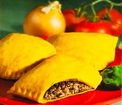 Jamaican Beef Patty · Jamaican beef patties are made with a rich flaky yellow pastry dough filled with seasoned ground beef. The pastry dough is made with flour, butter or shortening and beef suet and salt. 
