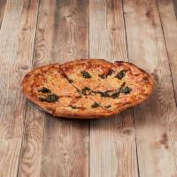Margherita Pizza · Red sauce, mozzarella and fresh basil.