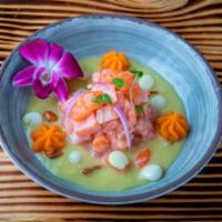 Ceviche Apaltado · Salmon ceviche with leche de tigre and avocado sauce. Marinated lightly in lime juice and se...
