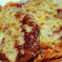 Chicken Parmesan · Penne chicken breast topped with homemade basil marinara sauce, mozzarella and parmesan chee...