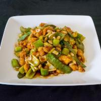 Kung Pao Chicken · White meat. Diced chicken with peanuts bamboo shoots and green peppers. Hot and spicy.