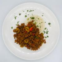 Beef Picadillo · Lean Ground beef, simmered in a seasoned tomato sauce with pimentos, green olives and raisin...
