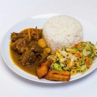 Curry Goat · Served with white rice or rice and peas with steamed veggies or salad and sweet plantains 