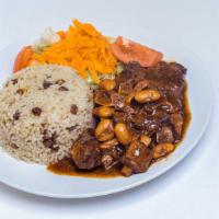 Oxtail · Served with white rice or rice and peas with steamed veggies or salad and sweet plantains 
