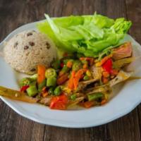 Escovitch Fish Meal · Served with white rice or rice and peas with steamed veggies or salad and sweet plantains or...
