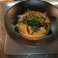 Sicilian Steamed Mussels · With spicy red wine marinara sauce