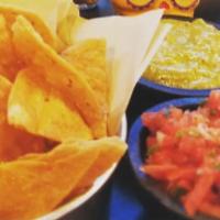 Salsa Duo · House corn chips and your choice of two: mexicana (mild), roja (hot), verde (mild). +$2 to s...