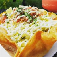 Taco Salad · Tortilla bowl, iceberg, chihuahua cheese, salsa Mexicana, cilantro crema, and your choice of...
