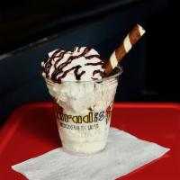 Classic Sundae · 2 flavors of ice cream, topped with whipped cream, chocolate sauce and a chocolate hazelnut ...