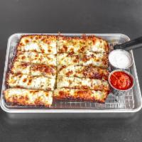 Como's Cheesiest Bread · Baked with 4 cheeses. Served with marinara and ranch.