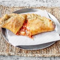 Big Meaty Calzone · Bacon, ham, pepperoni, sausage, ground beef and mozzarella cheese.