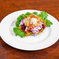 Enchiladas Guatemaltecas · Crispy tortilla topped with fried carrots and cabbage, radish, and beets salad cheese and Ch...