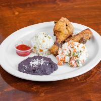 Pollo Rostisado · Fried chicken, served with rice, beans, and Russian salad. 