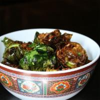 Brussel Sprouts (veg) · Crispy fried brussel sprouts tossed in a sweet & sour glaze with ginger and green onion 