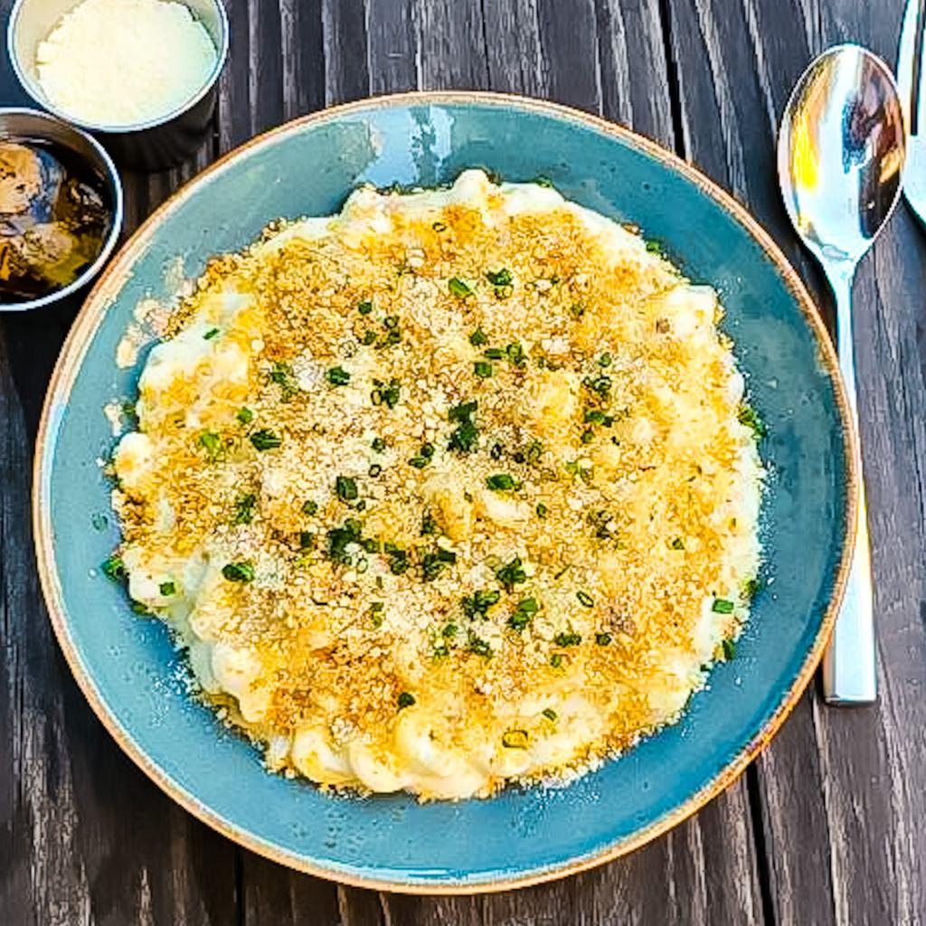 Truffle Mac and Cheese · Macaroni pasta cooked with cream & grated cheese then tossed with black truffle & toasted breadcrumbs