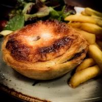 Meat Pie · Classic beef & gravy meat pie served with a side of fries and salad
