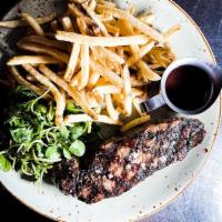 Steak Frites · 8oz NY strip Angus beef steak served with shoestring fries, watercress salad & bordelaise sa...