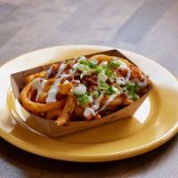 Fully Loaded Fries · Applewood-smoked bacon, cream, green onions, and melted cheddar cheese.