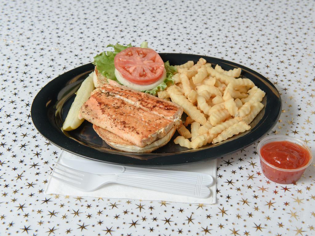 Grilled Tilapia Sandwich · Grilled Tilapia sandwich with crinkle cut fries.