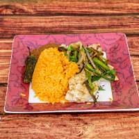 Arroz y Frijoles · Rice and beans.