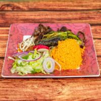 Bistec, Arroz, Frijol, Ensalada y Tortilla · Steak, rice, beans, salad and tortilla.