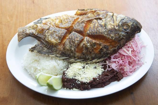 Fried Fish Plate · Served with rice, beans, plantains and salad. Fried fish, rice, beans, green banana and red salad.