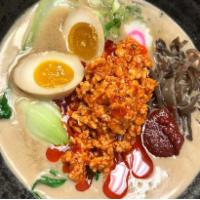 Tantan · Spicy ground chicken,  egg, sprouts,naruto,bokchoy,spicy miso, peanut butter chicken broth 