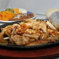Shrimp Fajita · Served with tortillas, rice and beans, guacamole, sour cream and cheese.