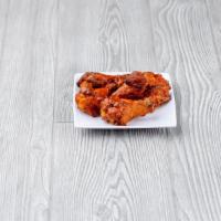 Chicken Wings · 6 chicken wings in your choice of sauce.