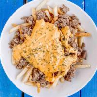 Steak + Cheese Fries · A heaping portion on fries loaded w/ shaved steak.   Your choice of queso or American Cheese...