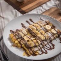 *Nutella Banana Crepes · Fresh sliced bananas rolled into three crepes. Topped with a rich Nutella spread