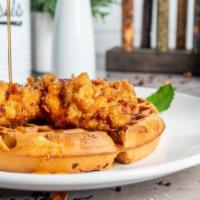 **Chicken & Waffle · Our Belgium waffle infused with bacon and topped with our handmade buttermilk fried chicken ...