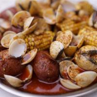 Clams · White clams meat is usually a tan creamy color with firm texture and mild fresh taste .