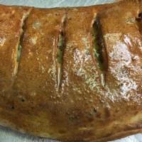 Veggie Stromboli · Black olives, mushrooms, tomatoes, green peppers, onions and extra cheese.