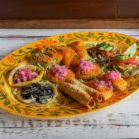 Tipico Yucateco · Panucho, salbutes, empanadas, tamales, codzitos, polcanes, and brazo de reina 2 each, pequen...