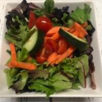 Garden Salad · Spring mix, loaded with cucumber, carrot, cherry tomato and your choice of dressings.