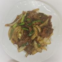 Mongolian Beef (L) · Sliced beef sauteed onions and scallions.
