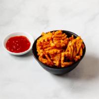 Spicy Waffle Fries · Lattice-shaped fried potatoes. Add melted cheese for an additional charge.
