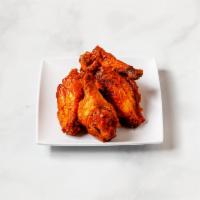 Flavored Wings · Cooked wing of a chicken coated in sauce or seasoning.