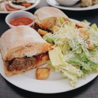 Sal's Meatball Sandwich · House-made meatballs covered in fresh marinara and mozzarella and oven baked. Served on toas...