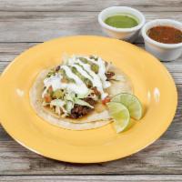 Supreme Taco · Same as regular taco with guacamole and sour cream.