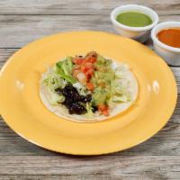 Vegan Taco · Taco with black beans, rice, lettuce, salsa freca and guacamole.