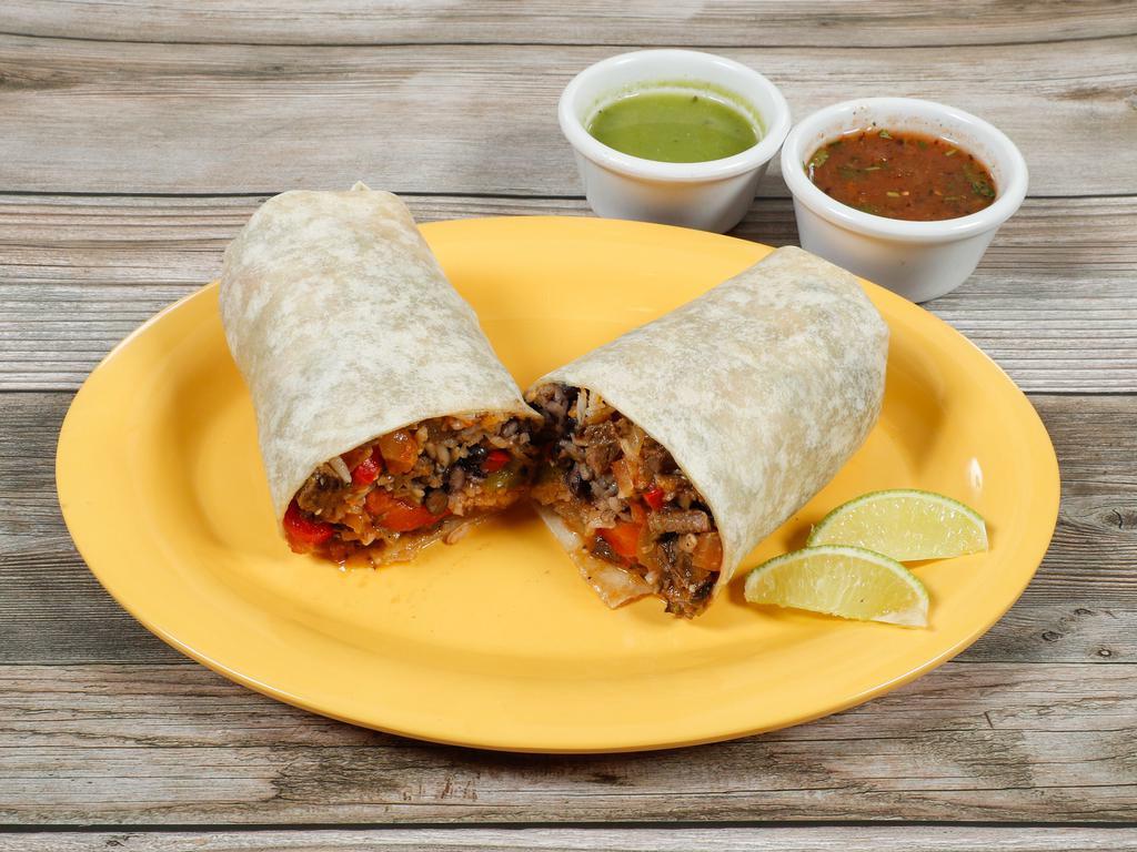 BOBBY’S Burrito · Flour tortilla stuffed with chicken breast or carne asada, red and green bell peppers and sliced onions sauteed in a cilantro and garlic butter sauce with black beans, rice, cheese, salsa ranchera and salsa fresca.