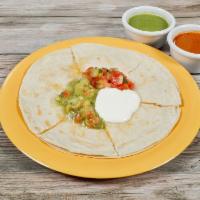 Regular Quesadilla · 2 Flour tortillas with melted cheese. Topped with guacamole, sour cream and salsa fresca.