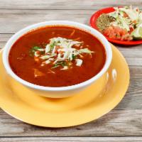 Pozole (Pork & Hominy soup) · An Authentic Guajillo hominy soup with pork! comes with cilantro, onions, cabbage, lime and ...