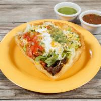 Taco Salad · Large crispy flour tortilla shell filled with whole pinto beans, your choice of meat, lettuc...